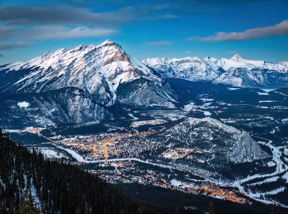 The Banff Townsite from the BAnff Gondola with Tunnel Mountain and Cascade Mountain in Banff National Park.